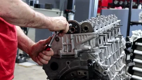 Mechanic working on car engine Stock Footage 197417169