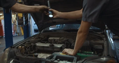 Mechanic Working On Car 스톡 동영상 105244726