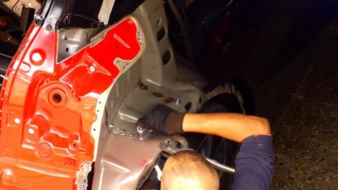 Mechanic Working on Car Frame Stock Footage 97635221