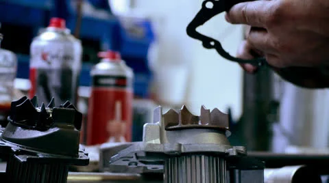 Mechanic working on car part Stock Footage 24820059