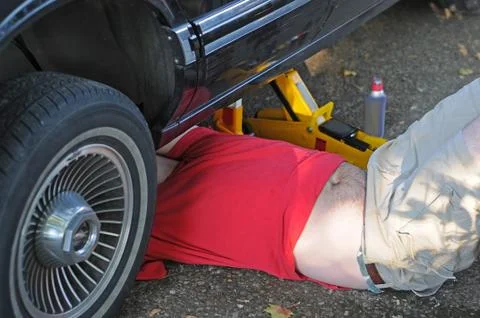 Mechanic working on a car Stock Photos