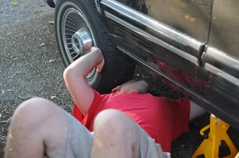 Mechanic working on a car Stock Photos