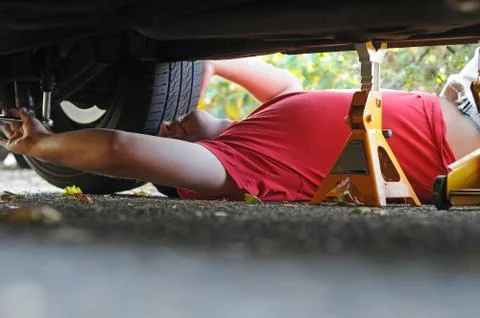 Mechanic working on a car Stock Photos