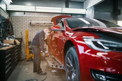 Mechanic working on a car Stock Photos