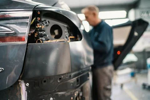 Mechanic working on a car Stock Photos