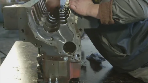 Mechanic working with diesel engine. Engine repair close up. In hands tool Stock Footage 74915498