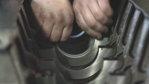 Mechanic working with diesel engine. Engine repair close up. In hands tool Stock Footage 74916011