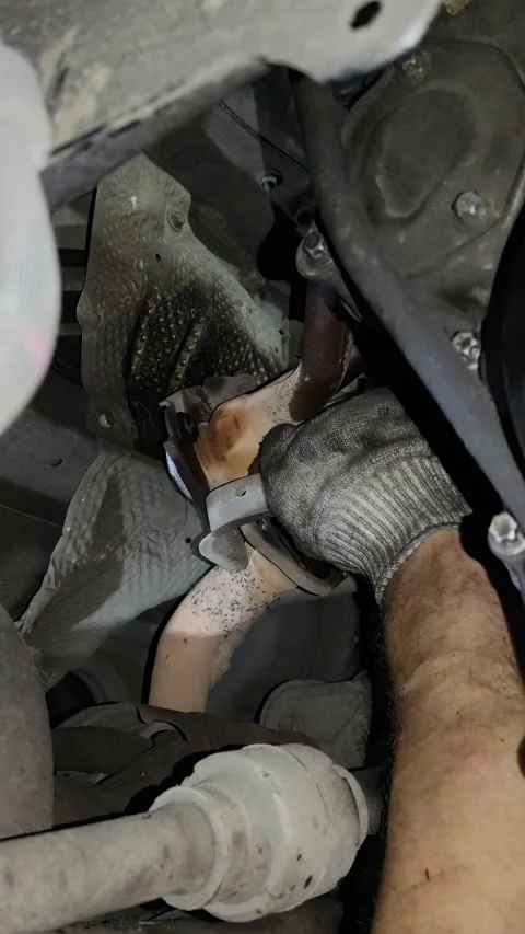 Mechanic working on dirty car engine with gloved hands Stock Footage 346638468