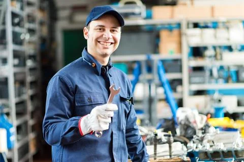 Mechanic working in his workshop Photos