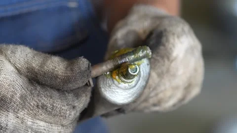 Mechanic Working on Suspension Control Arm Stock Footage 345563786