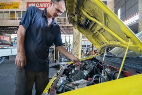 Mechanic in workshop service Stock Photos
