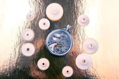 Mechanical analog stopwatch on a colored background. Time part precision. M.. Stock Photos