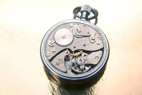 Mechanical analog stopwatch on a colored background. Time part precision. M.. Stock Photos