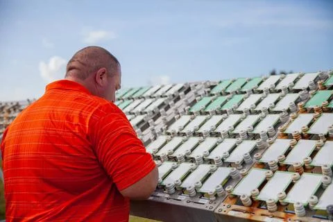 A Mechanical and Environmental Testing Lab engineer examines samples at th... Fotos de archivo