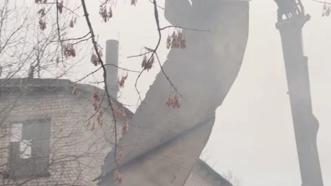 Mechanical arm claw of crane clears blockage of the twisted metal. Stock-Footage 145991458