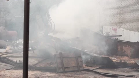 Mechanical arm claw of crane clears blockage of the twisted metal. Stock-Footage 145991487