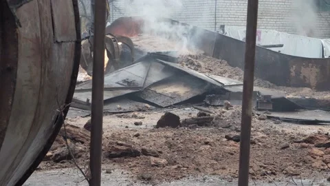 Mechanical arm claw of crane clears blockage of the twisted metal. Stock-Footage 145991807