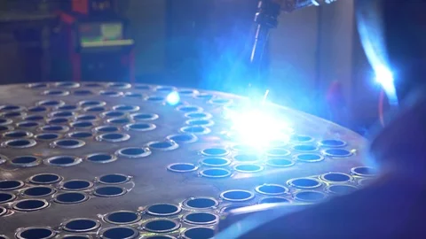 Mechanical arm with welding machine in factory, robot in production, automated Stock Footage 120071096