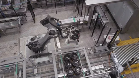 Mechanical automated robot lifting and moving items, drone aerial 4K Stock Footage 101153429