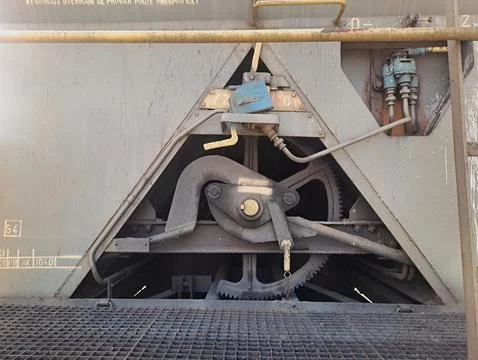 Mechanical braking system on an old freight railway wagon. Stock Photos