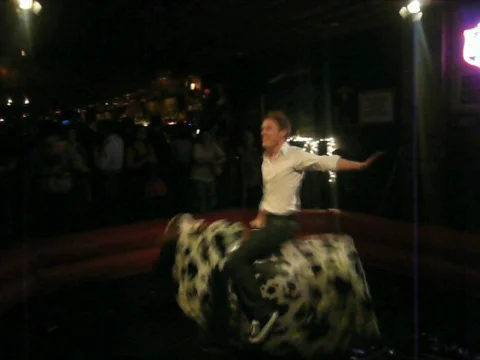 Mechanical bull riding Stock Footage 695550