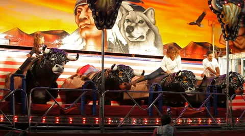 Mechanical bulls at funfair 스톡 동영상 56837291