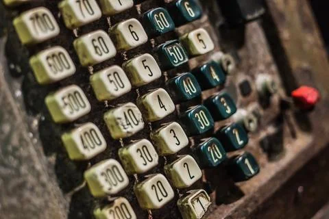Mechanical cash register numeric button grid vintage device Stock Photos