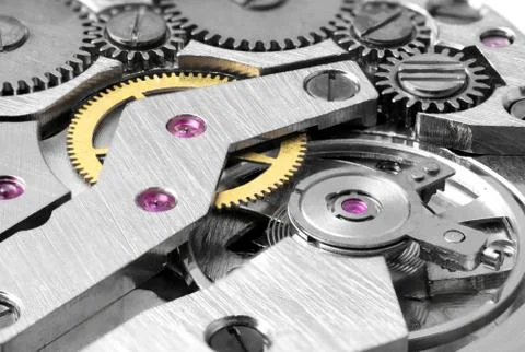 Mechanical clock mechanism close up. clock gears macro Stock Photos