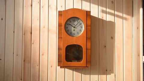 Mechanical clock in a wooden case Stock Footage 73402964