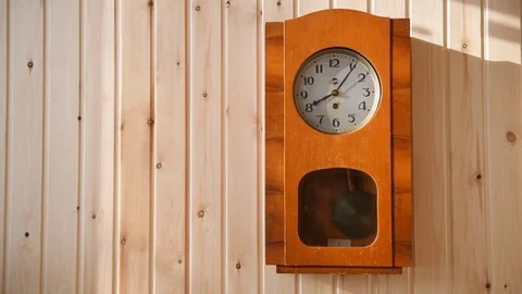 Mechanical clock in a wooden case Stock Footage 73403004