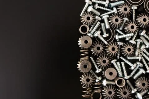 Mechanical components on black background. Industrial objects Stock Photos