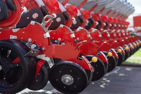 Mechanical components of a large agricultural seed drill, highlighting the .. Stock Photos