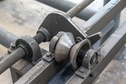 Mechanical components of transmission device for CNC steel joint production.. Stock Photos