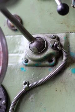 Mechanical control lever for metalworking machine with electric drive in the  Stock Photos