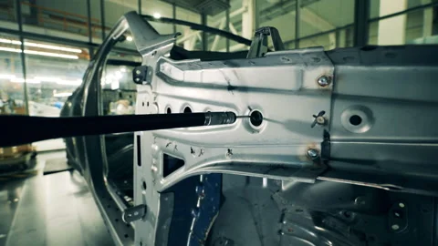 Mechanical device is checking weld precision in a car door Vídeo Stock 142784710