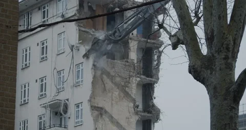 Mechanical Dinosaur eating homes  Stock Footage 149492541