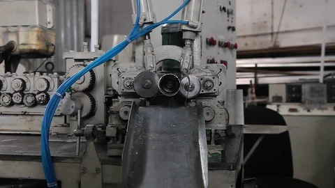 Mechanical dump truck filter making machine Stock Footage 83909088