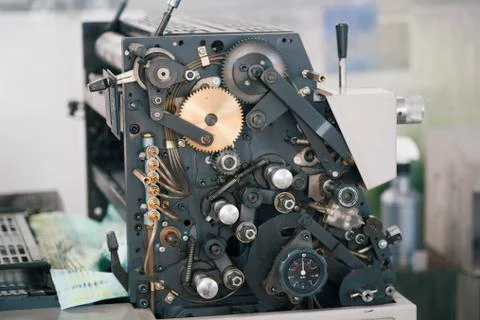 Mechanical elements of printing press machine in a printing plant Stock Photos
