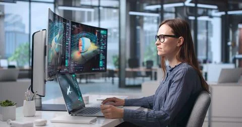 Mechanical Engineer Analyzing 3D Car Part Design Using Advanced Computer Soft Stock Photos