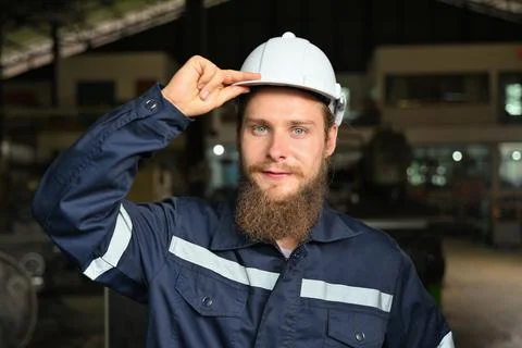 Mechanical engineer repairing engine machine at factory Foto stock