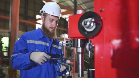 Mechanical engineers are checking the working condition of the new machine Stock Footage 254550936