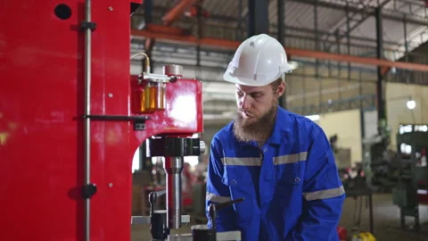 Mechanical engineers are checking the working condition of the new machine Stock Footage 254551358