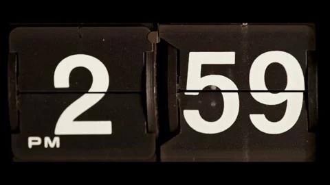 Mechanical flip clock changes from two fifty nine pm Stock Footage 329667720