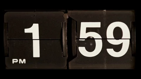 Mechanical flip clock flipping from one fifty nine pm Stock Footage 329667671
