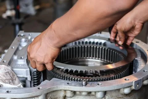 Mechanical gear assembly in workshop. Stock Photos