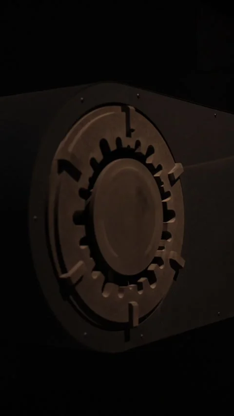 Mechanical Gear Display With Rotating Ring in Dark Exhibition Stock Footage 346652198