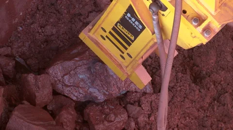 Mechanical hammer splits a rock Stock Footage 55040618