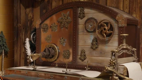 Mechanical hand holding a quill pen at Santa Claus Village in Rovaniemi Stock Footage 340484792