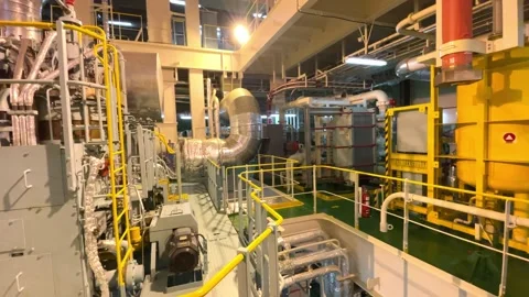 A mechanical, industrial feel in the engine room of a contemporary vessel. Stock Footage 331353018