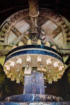 Mechanical interior of an old fashioned flour mill the netherlands Stock Photos